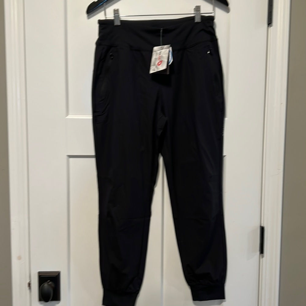 NWT women’s Baleaf waterproof UPF, 50+ pants size m